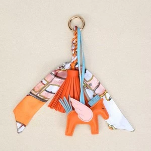 The Equine Warehouse Winged Horse Bag Charm - PU Leather Pendant with Ribbon - Orange in Orange