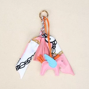 The Equine Warehouse Winged Horse Bag Charm - PU Leather Pendant with Ribbon - Pink in Pink