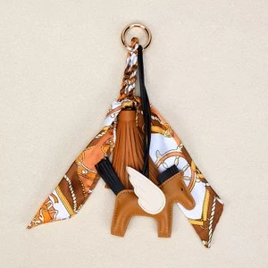 The Equine Warehouse Winged Horse Bag Charm - PU Leather Pendant with Ribbon - Brown in Brown