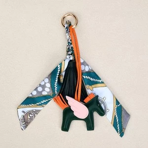 The Equine Warehouse Winged Horse Bag Charm - PU Leather Pendant with Ribbon - Bottle Green in Green